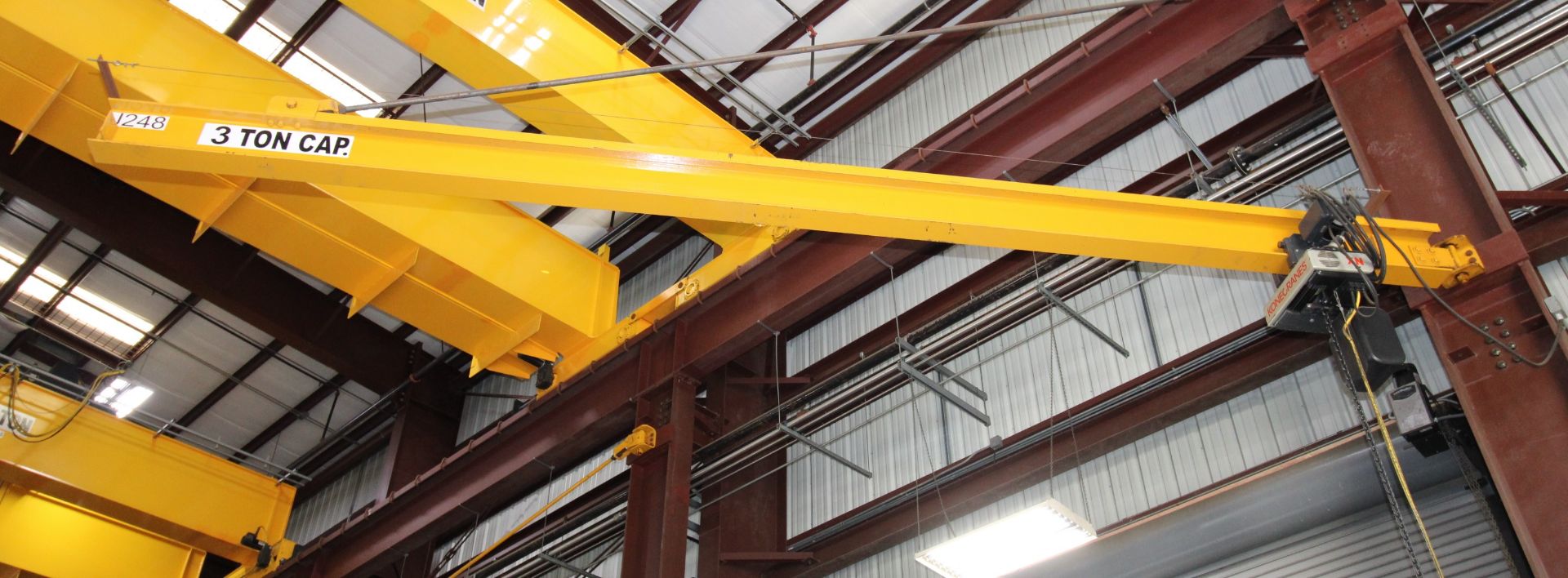 COLUMN MOUNTED JIB CRANE, 3 T. X APPROX. 20' REACH, 18' ht. under hook, Kone 3 T. elec. chain hoist,