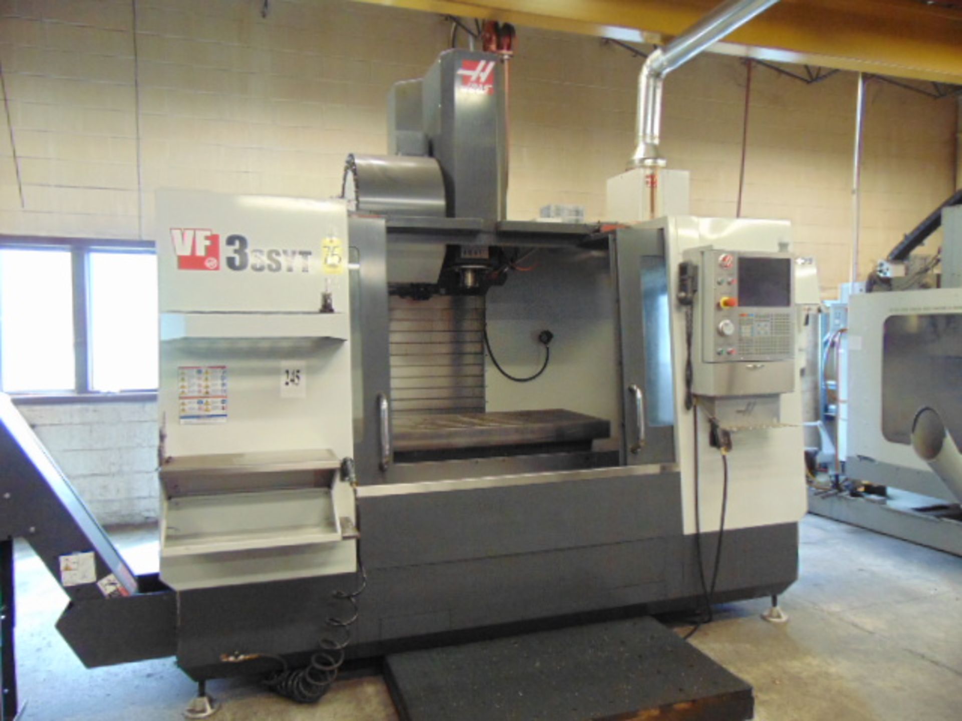 VERTICAL MACHINING CENTER, HAAS MDL. VF3SSYT, new 1/2016, 54” X 24” table, 1,750 lb. load, 40” X,