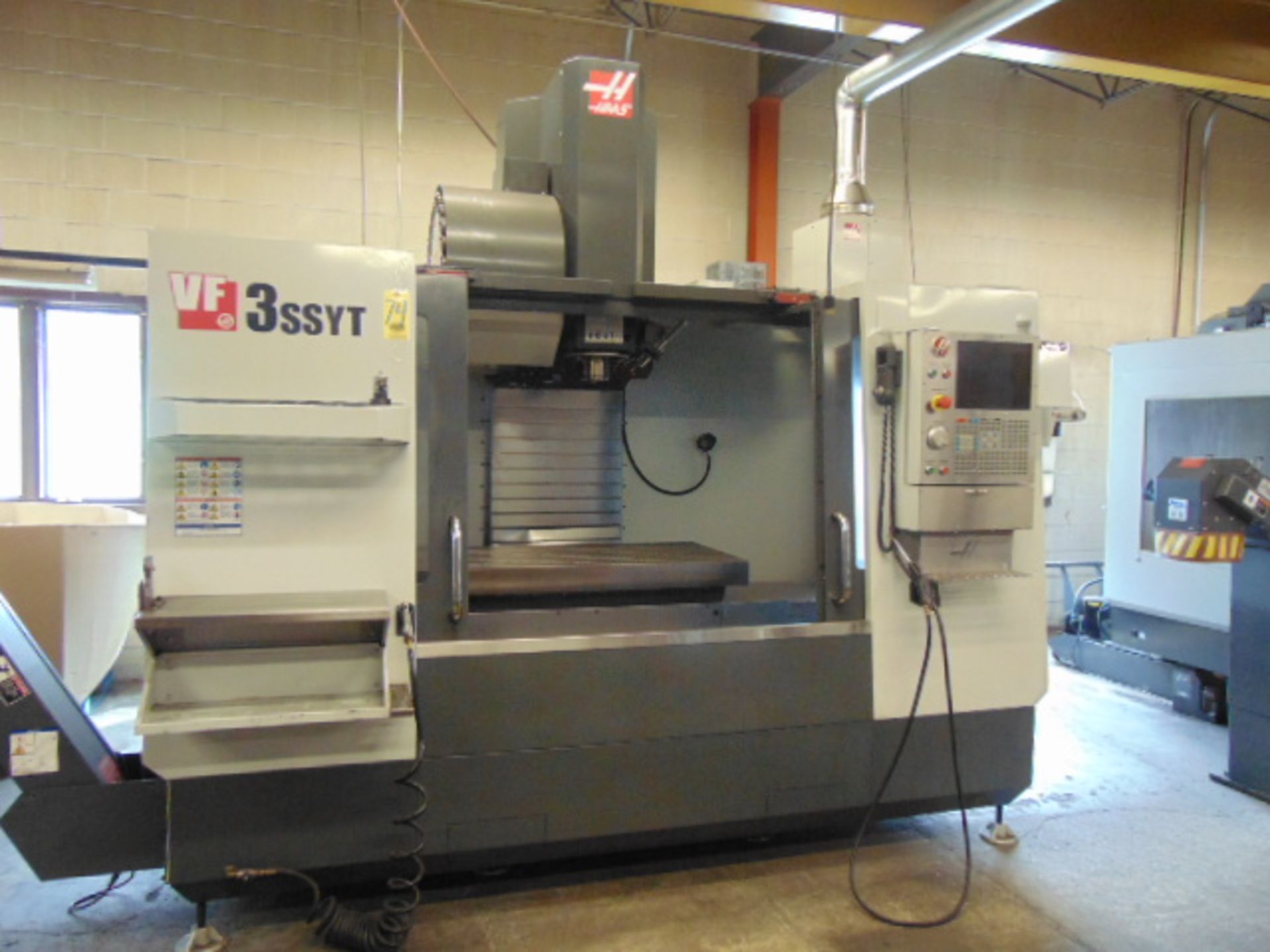 VERTICAL MACHINING CENTER, HAAS MDL. VF3SSYT, new 1/2016, 54” X 24” table, 1,750 lb. load, 40” X,