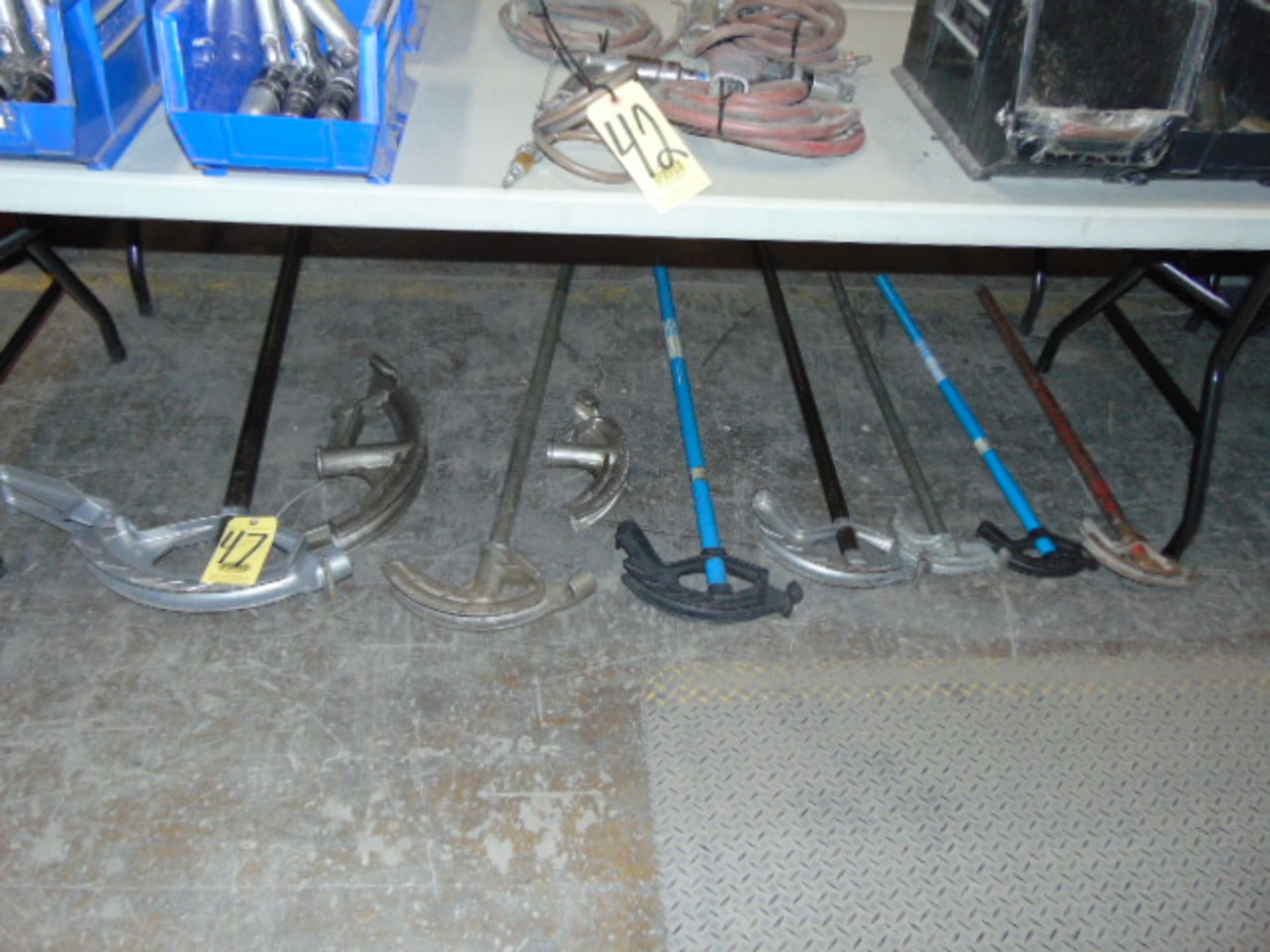 LOT OF CONDUIT BENDERS, assorted (under one bench)