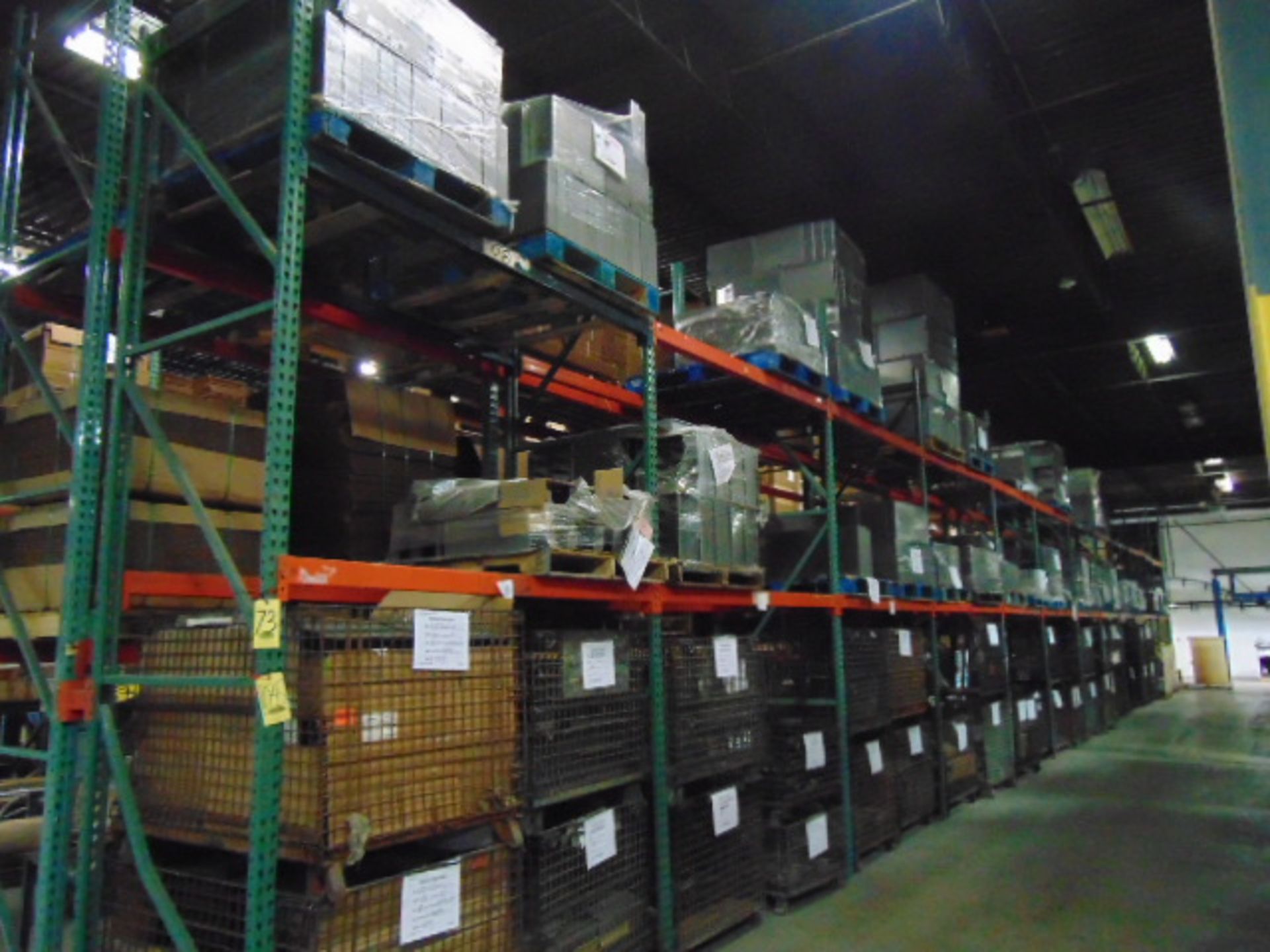 LOT CONTENTS OF PALLET RACKING SECTIONS (24) : steel parts, cardboard boxes (no powder coat or