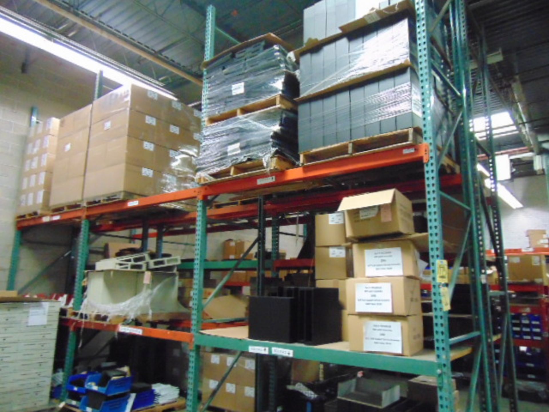 LOT CONSISTING OF: steel parts & cardboard boxes (in six pallet racking sections) (no racks)