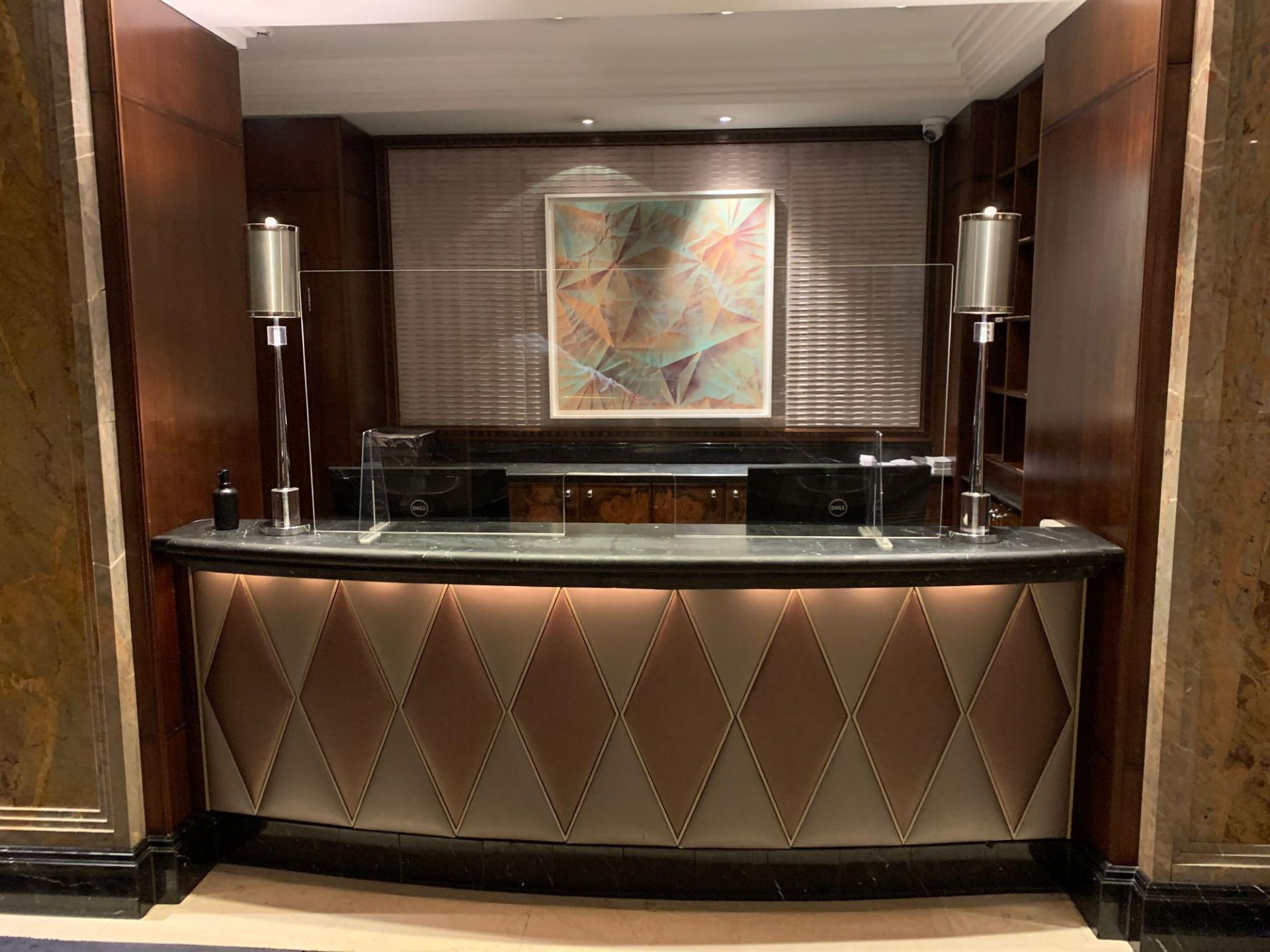 Reception Counter With Black Marble Top And Curved Front Padded Fascia At Front Of Desk 270cm