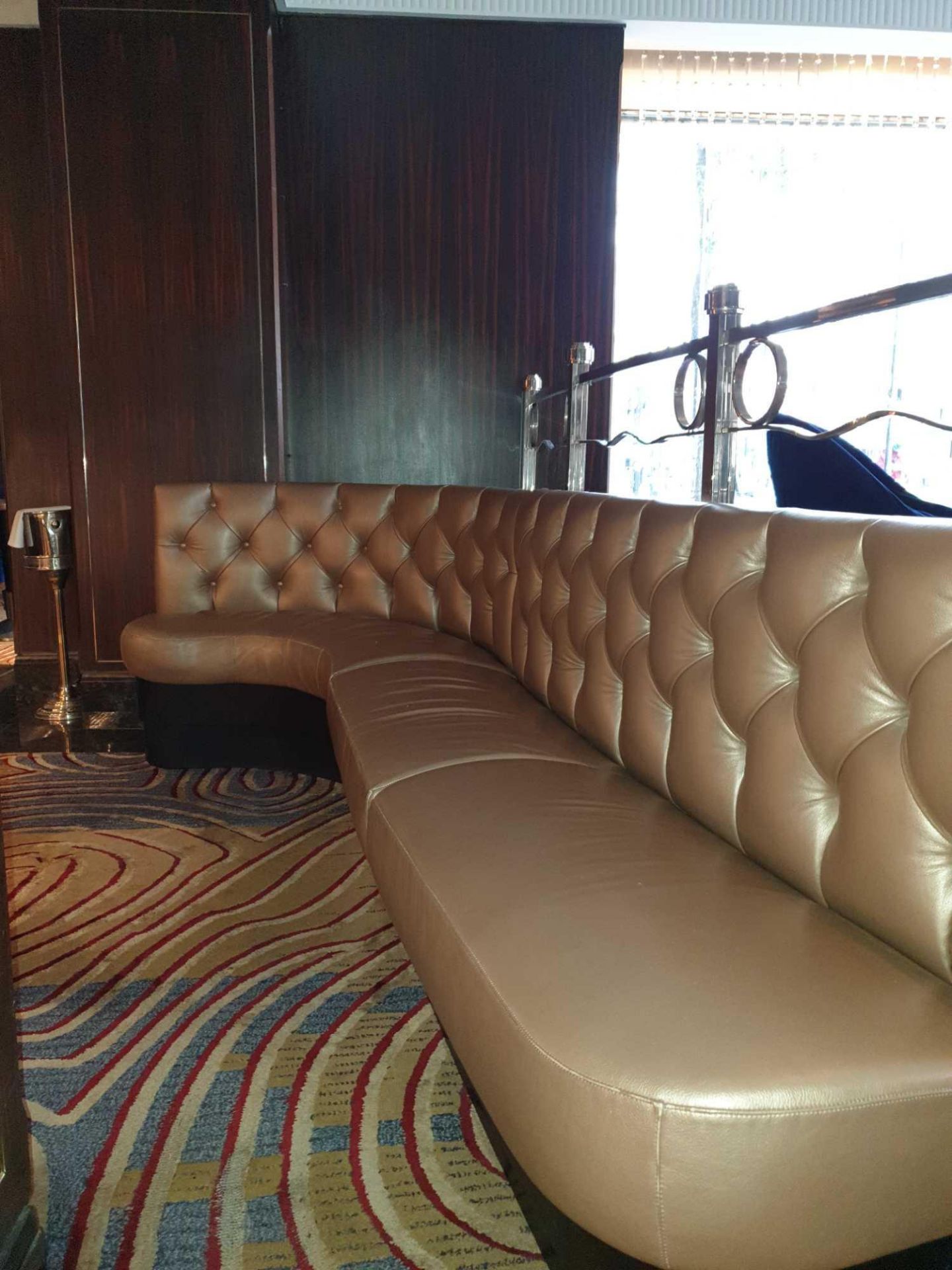 Edelman Leathers Extra Long Serpentine Banquet Seating In Gold Leather With Tufted Button Back