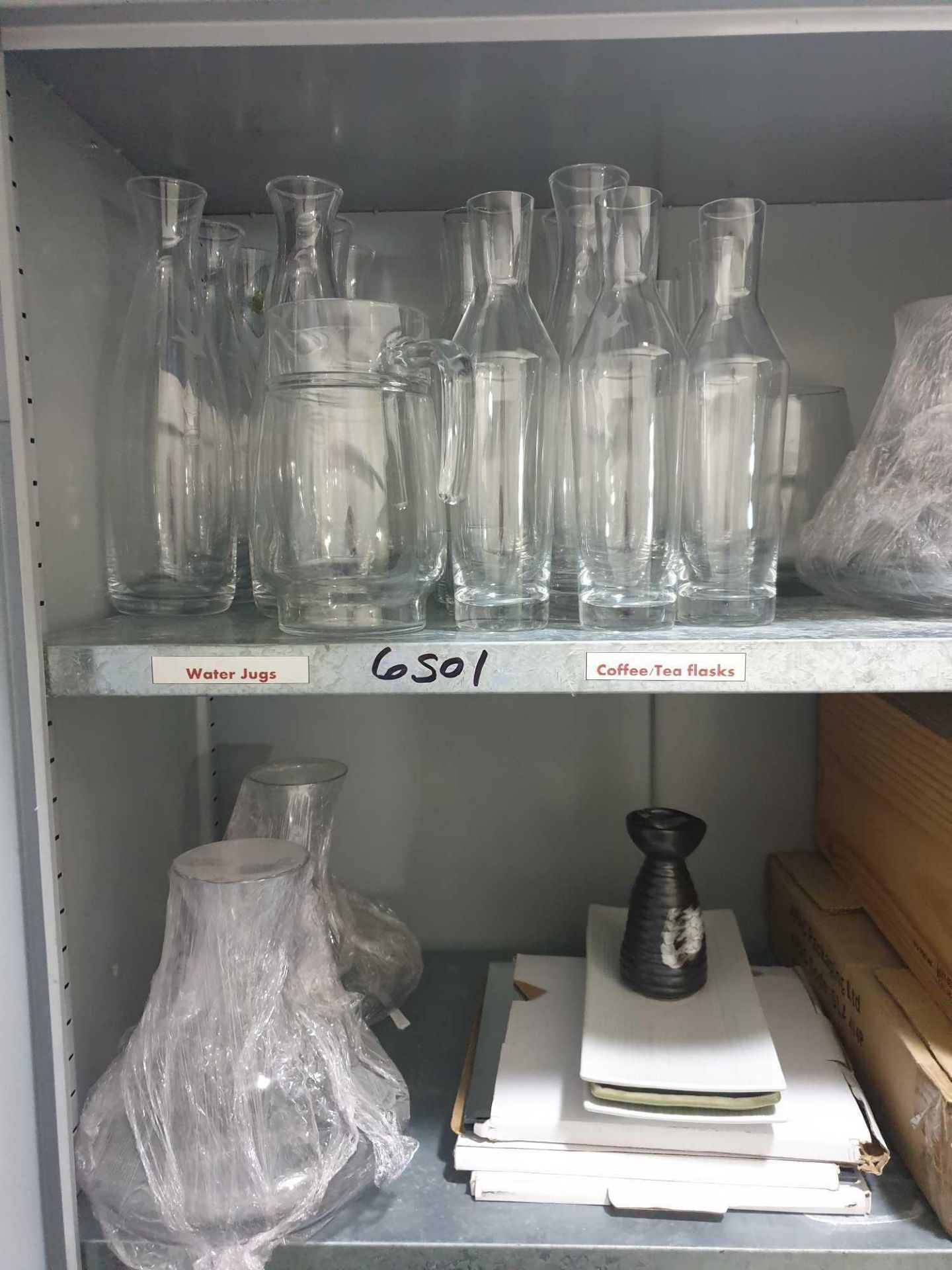 A Quantity Of Glass Bud Vases As Found