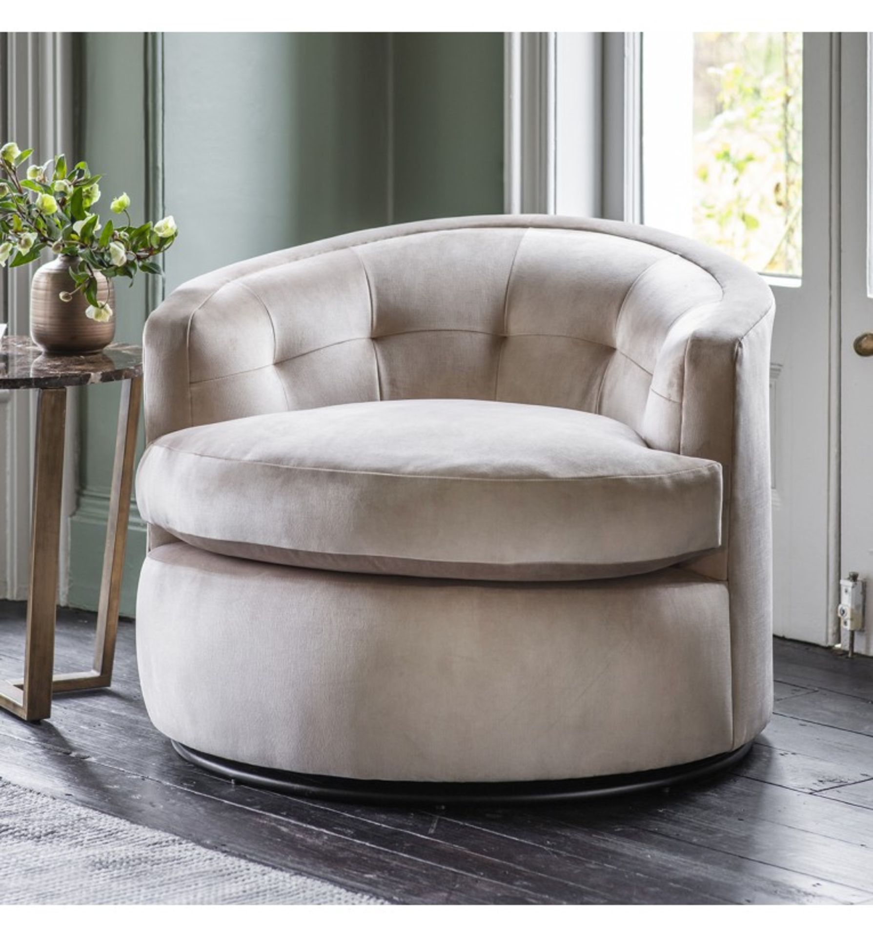 Mayfair Luxury Swivel Armchair The Mayfair collection features deep pulled stitching detailing and a