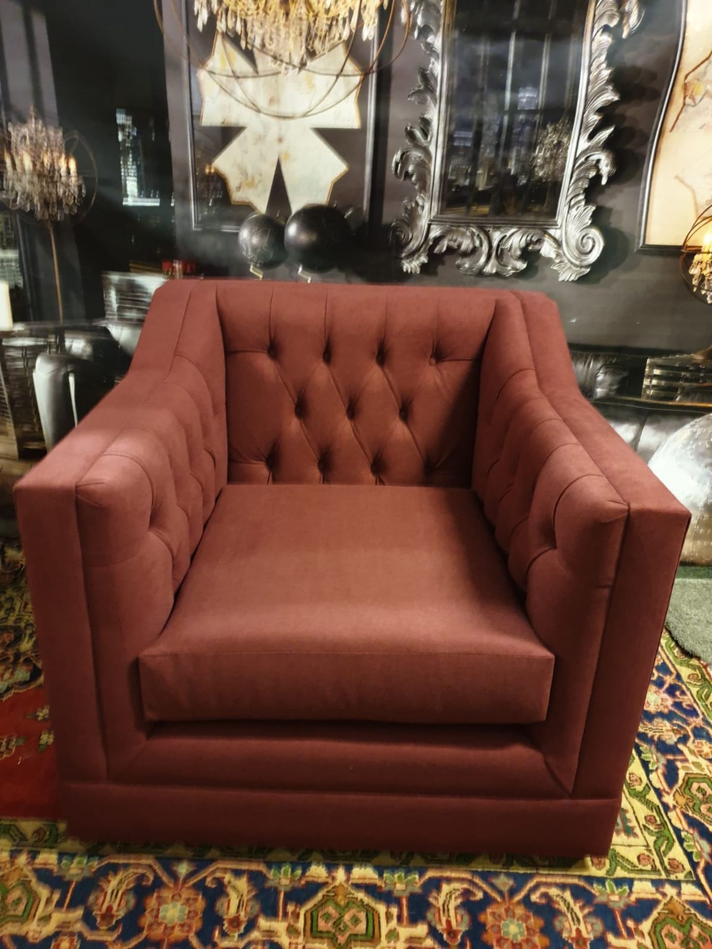 James Armchair Berwick Marsala Style thy name is James. This twist on a Chesterfield is a classic