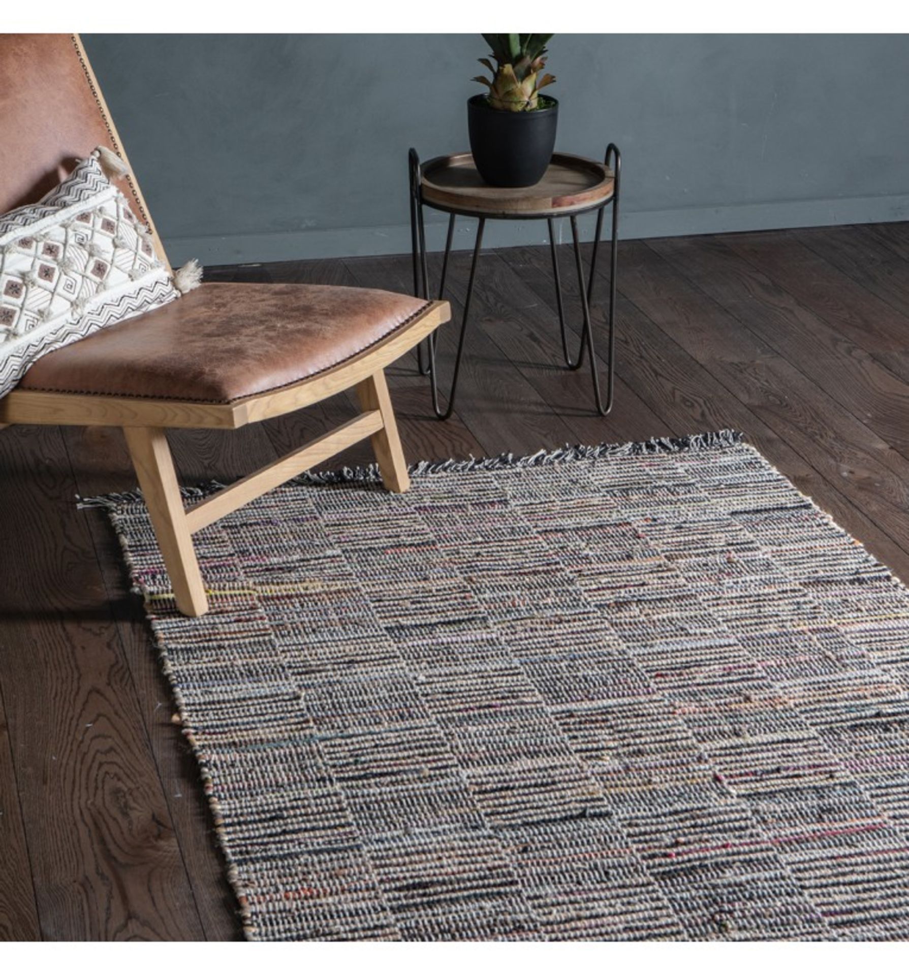 Alonzo Rug Multi This statement hand loomed rug is crafted using re-cycled materials in a striking