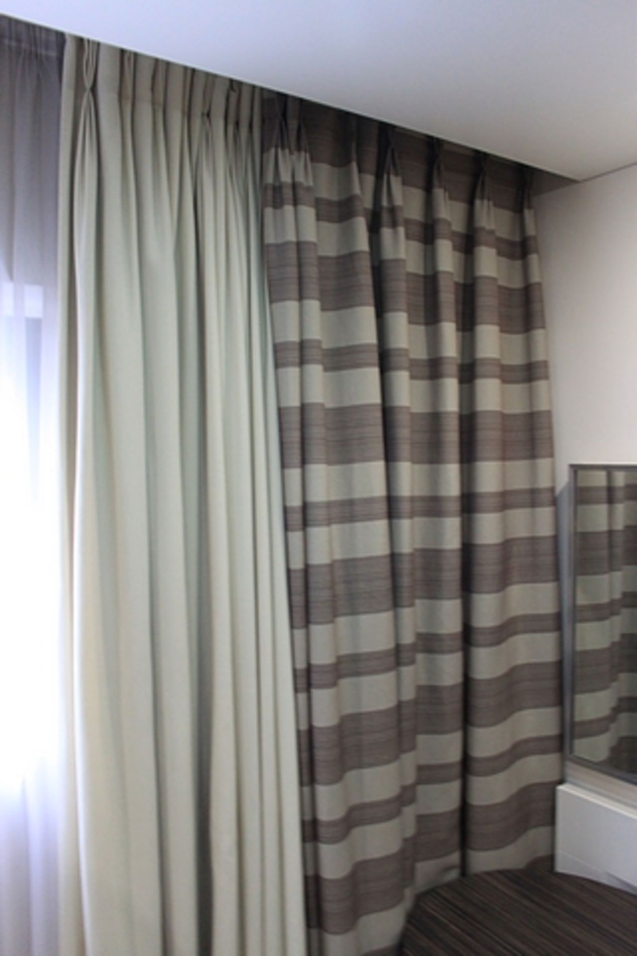 Sinclaire Fabrics a pair of drapes lined with blackout fabric spans 2000 x 2600mm (FM32AP1)