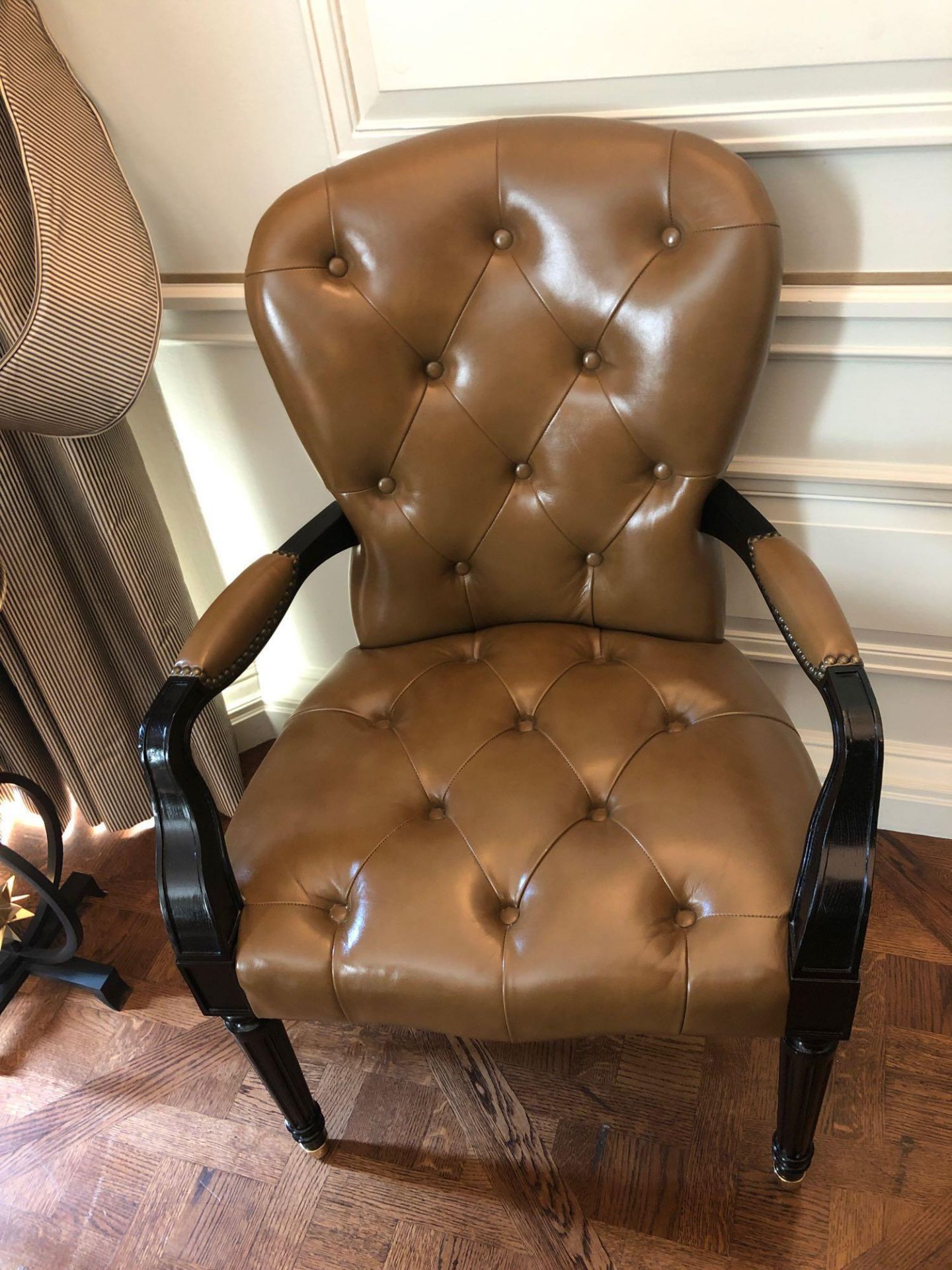 A Leather Tufted Armchair With Chesterfield Style Button And Stud Detail 60 x 63 x 95cm (Room 207/