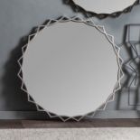 Novia Mirror Silver This Modern Round Wall Mirror has a overlapping silver coloured frame As round