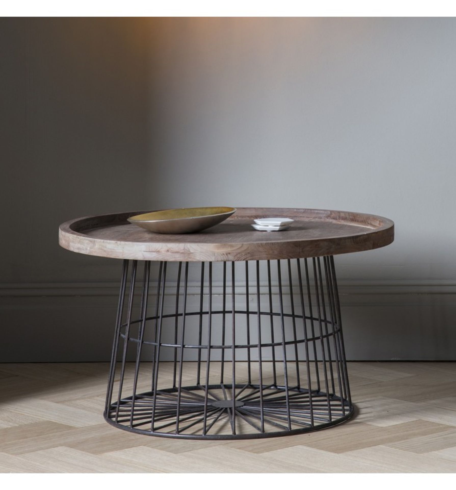Menzies Coffee Table The Menzies Coffee Table Features A Caged Gun-Metal Frame And Base With A