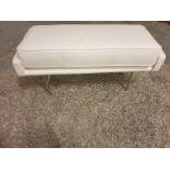 White end of bed bench This elegant bench adds dramatic style to your home. The understated