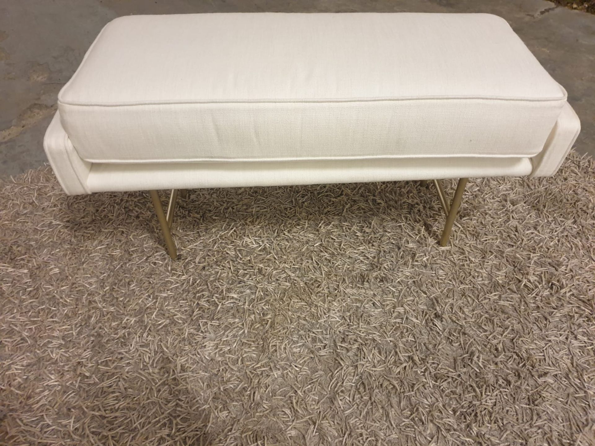 White end of bed bench This elegant bench adds dramatic style to your home. The understated