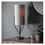 Romana Table Lamp Black Spruce up any table or desk area by welcoming this stunning table lamp.