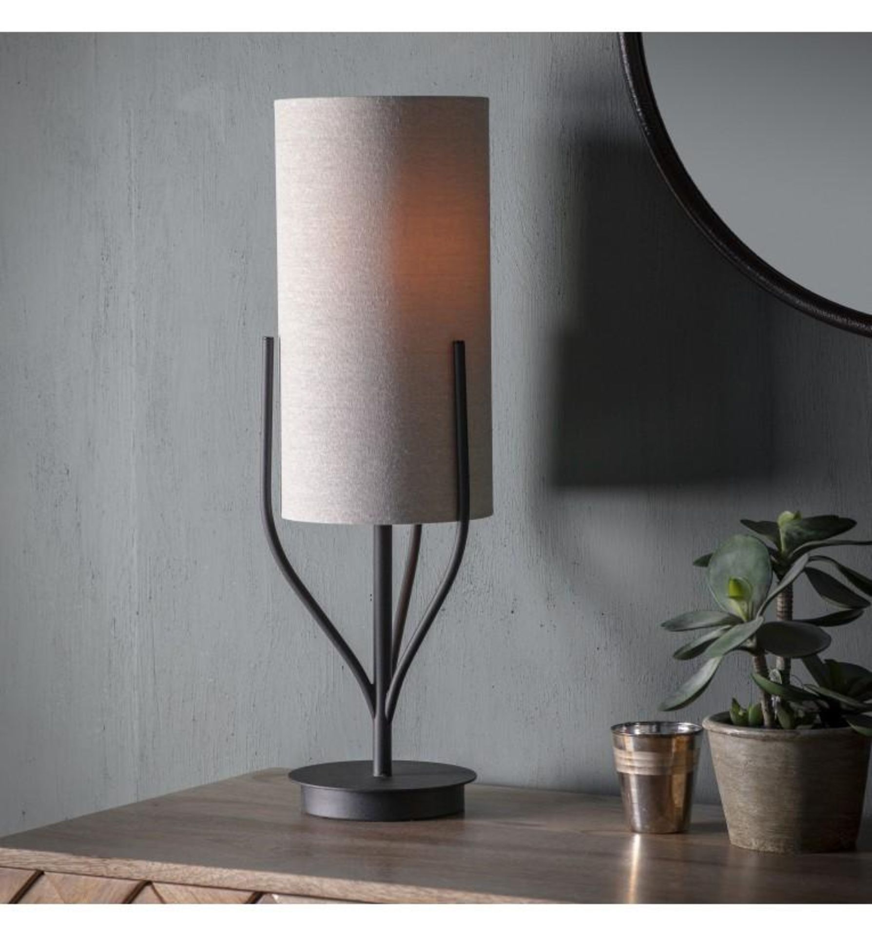 Romana Table Lamp Black Spruce up any table or desk area by welcoming this stunning table lamp.