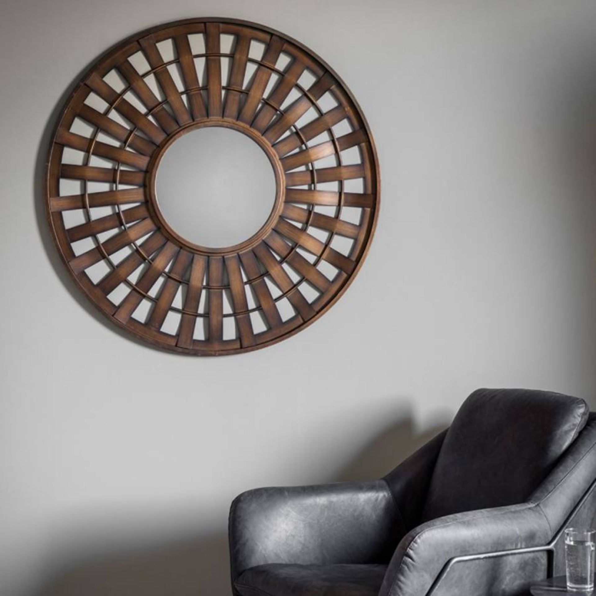 Mitcham Mirror Bronze in colour, this rustic round wall mirror will help finish off the look you