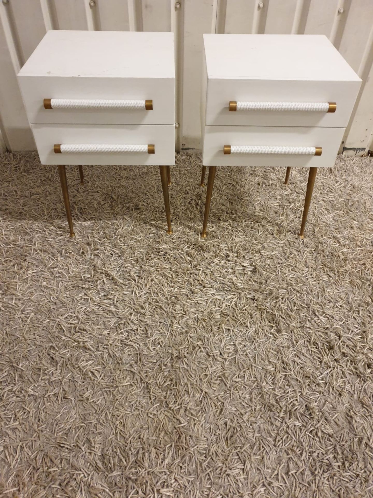 A pair of nightstands two drawer A stunning staple equipped night table with gorgeous gold-finish