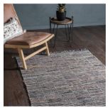 Alonzo Rug Multi This statement hand loomed rug is crafted using re-cycled materials in a striking