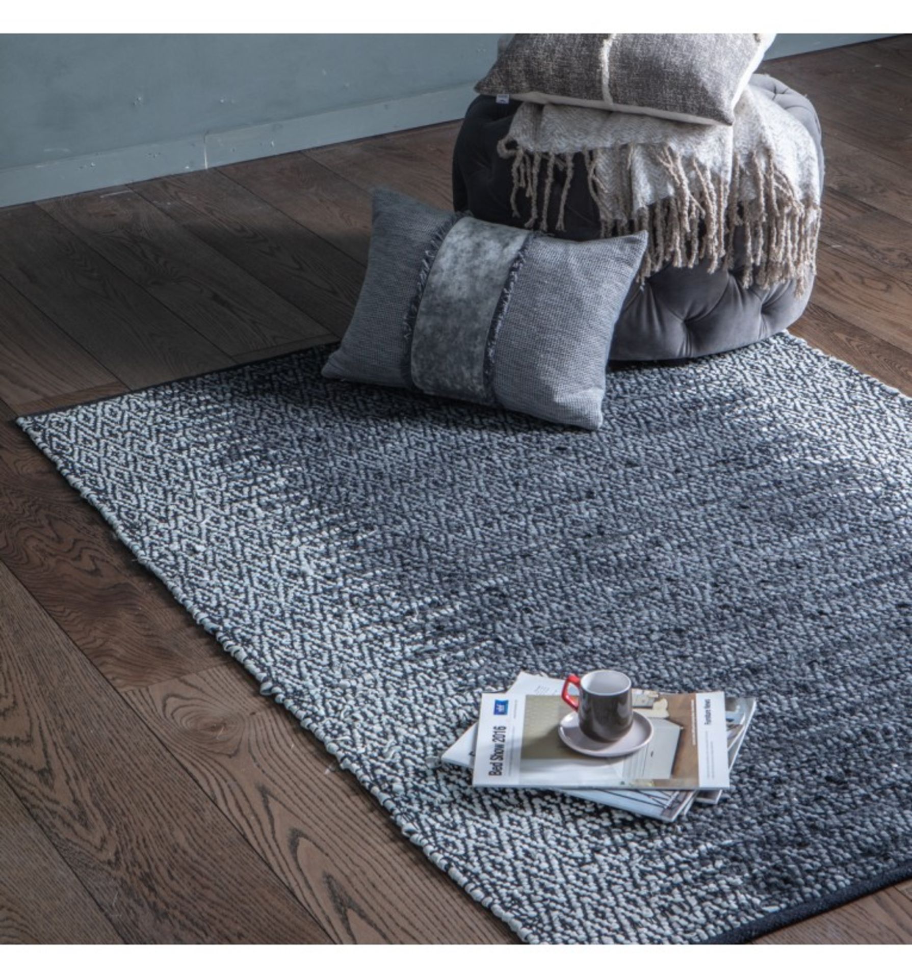 Garcia Leather Rug Grey An eye-catching woven leather diamond rug design with a bold monochrome