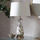 Odyssey Glass And Nickel Frosted Table Lamp Light up any surface with our new table lamps. When