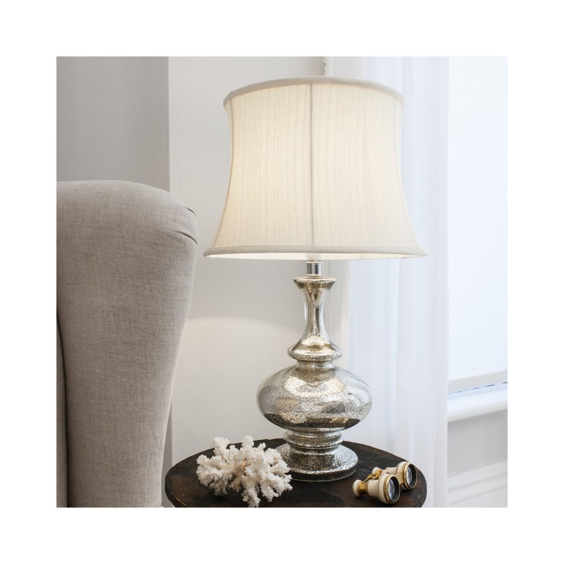 Miranese Table Lamp With it's wonderful gold speckled glass base and fluted cream drum shade, this