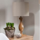 Argenta Table Lamp Sleek twisted modern design with a natural linen fabric shade Dimensions: 33.5