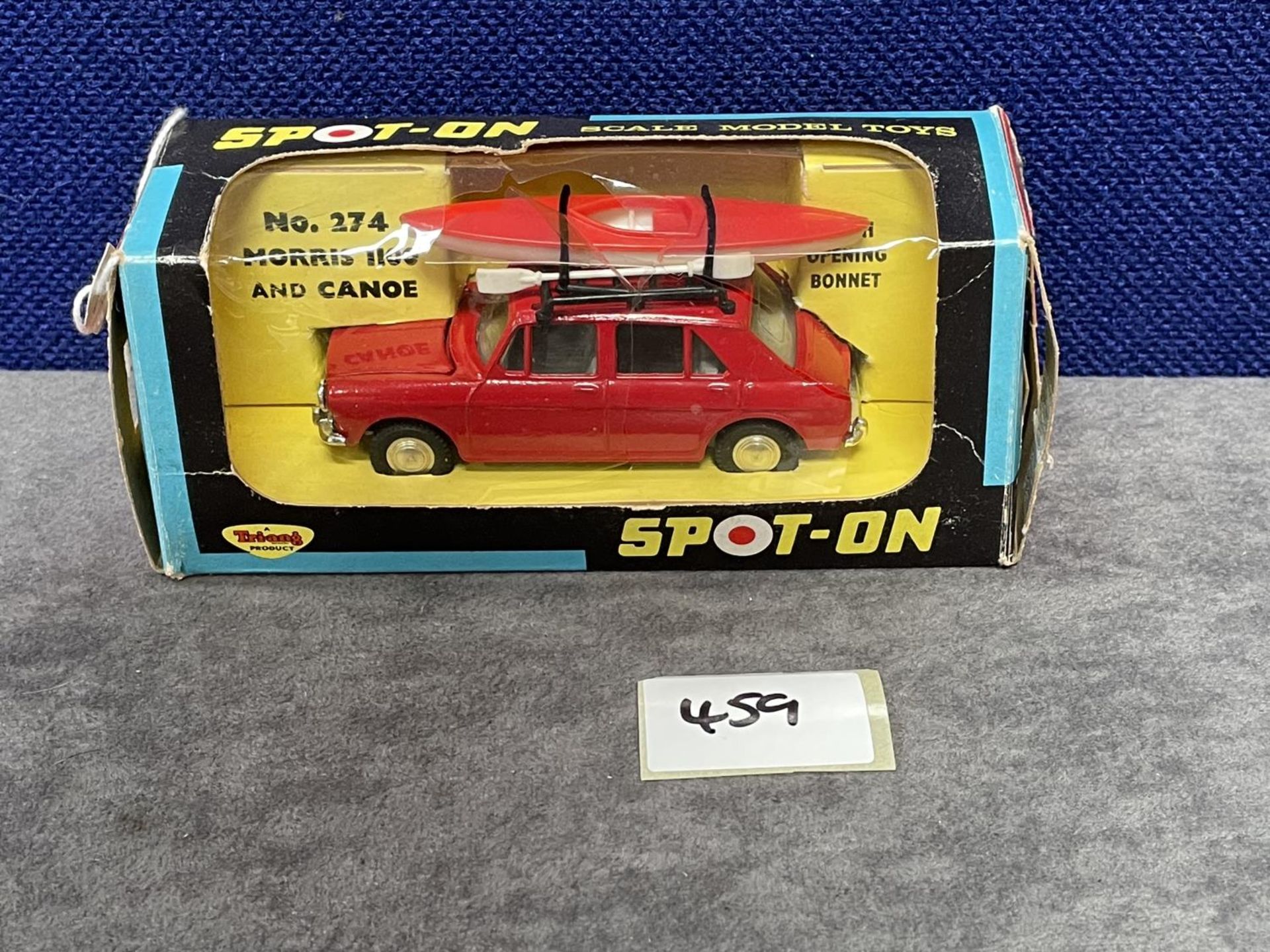 Spot-On #274 Morris 1100 With Canoe Green - Red/White Canoe. Mint Model In Excellent Box Damage To