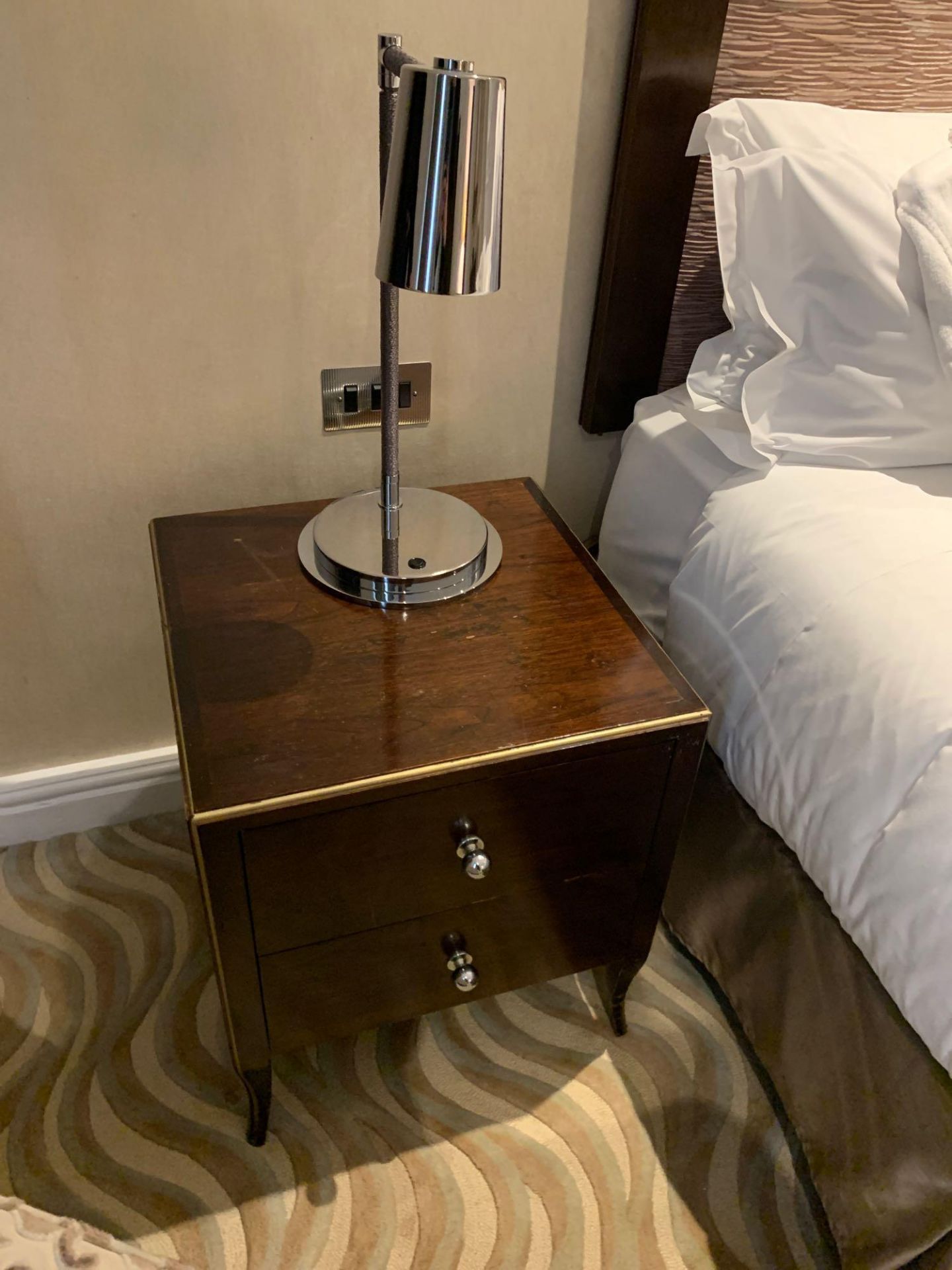 A Pair Of Two Drawer Bedside Tables With Gold Trim On 4 Tapering Legs Nickel Handles 50cms X 50cms