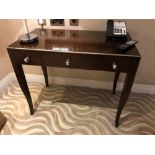 A Three Drawer Dressing Table On Four Legs With Gold Trim Spring Drawer With Nickel Handles 51cm