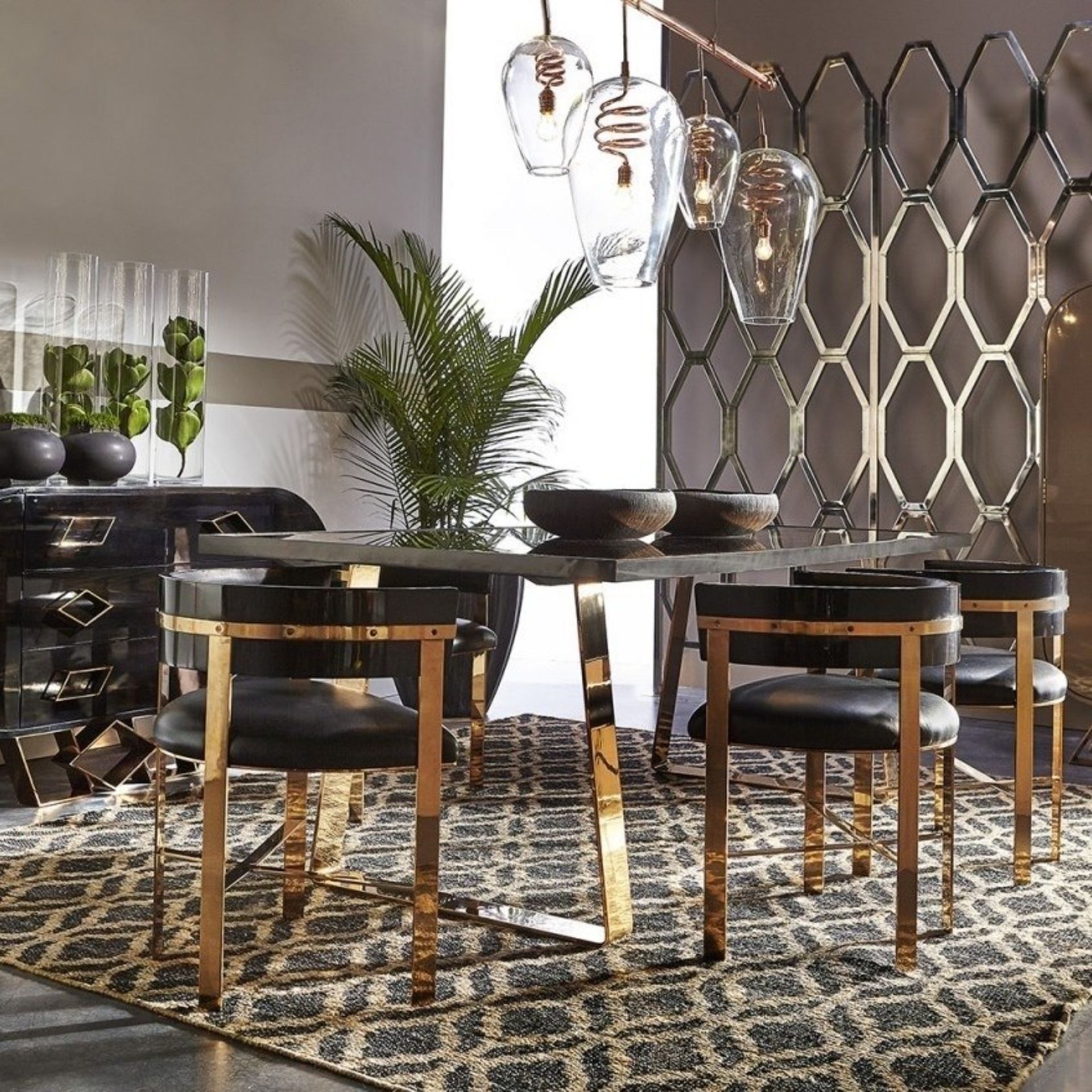 Art Dining Chair - Mirrored Brass / Black Onyx Leather The Art Dining Chair Incorporates Aspects