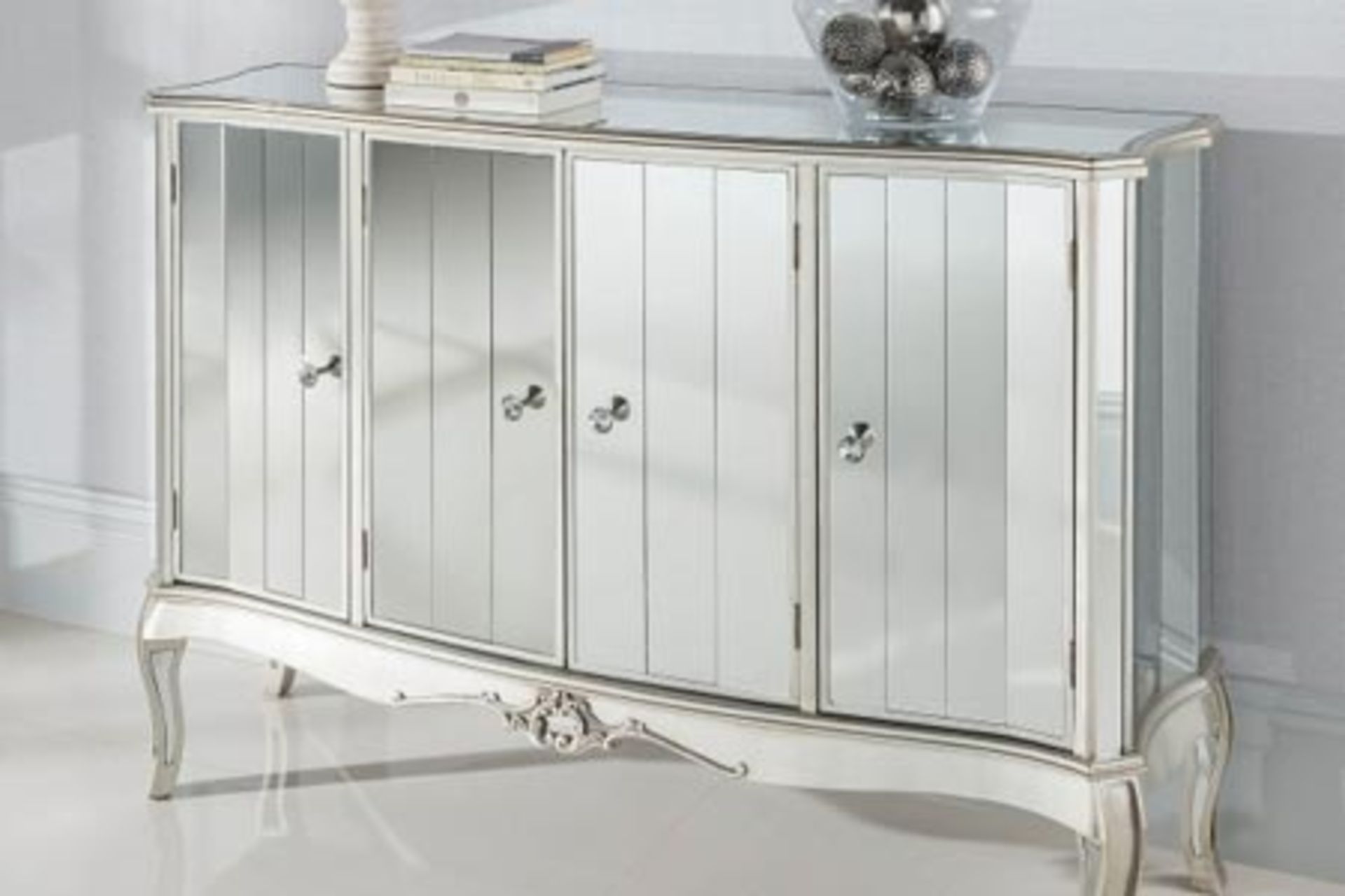 Argente Mirrored Four Door Sideboard This is one of the larger pieces in this glamorous range,