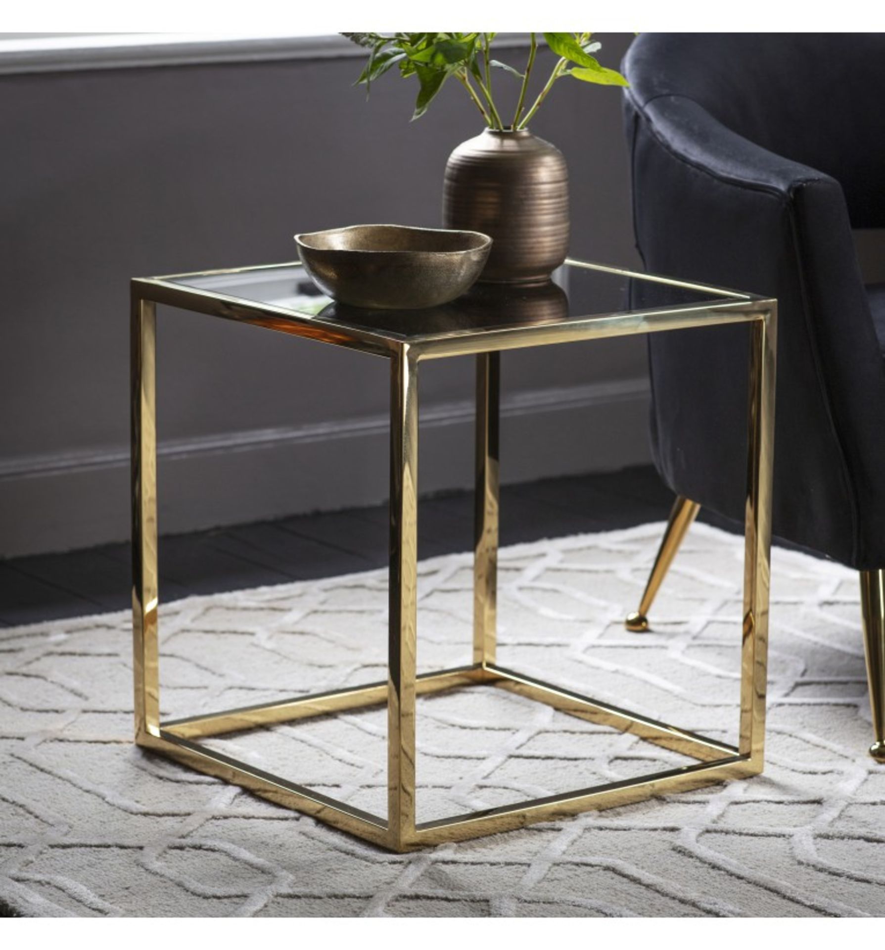 Santorini Side Table Gold The Santorini Side Table Table is finished with a gold frame and a glass