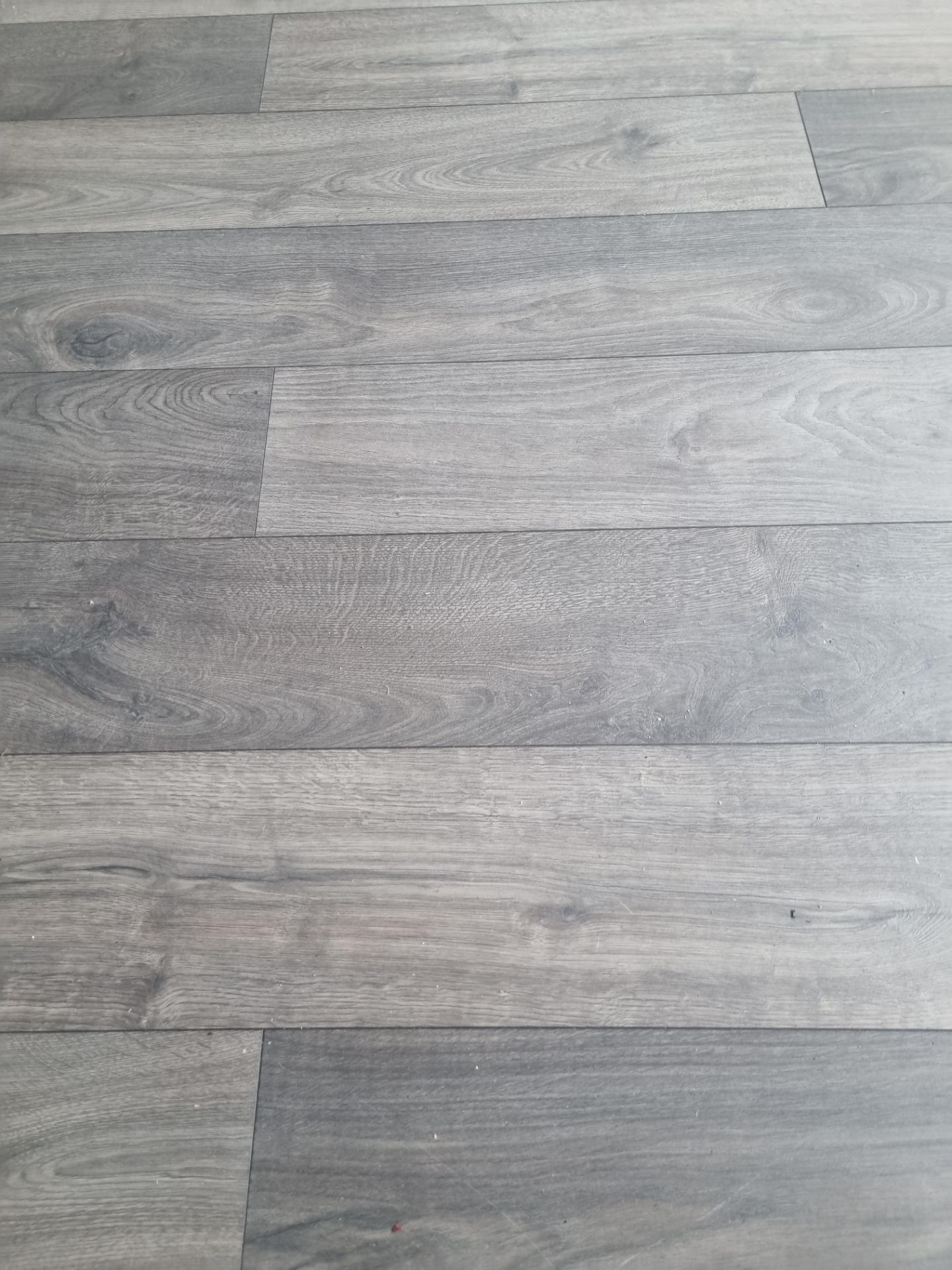 Dartmoor Oak grey laminate flooring approximately 6m x 5m ( Room 6)