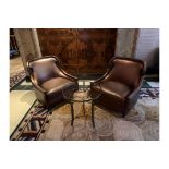 A Pair Of Edelman Lounge Chairs In A Bronze Leathered Upholstery With Studied Pattern. 82x 75x 90cm