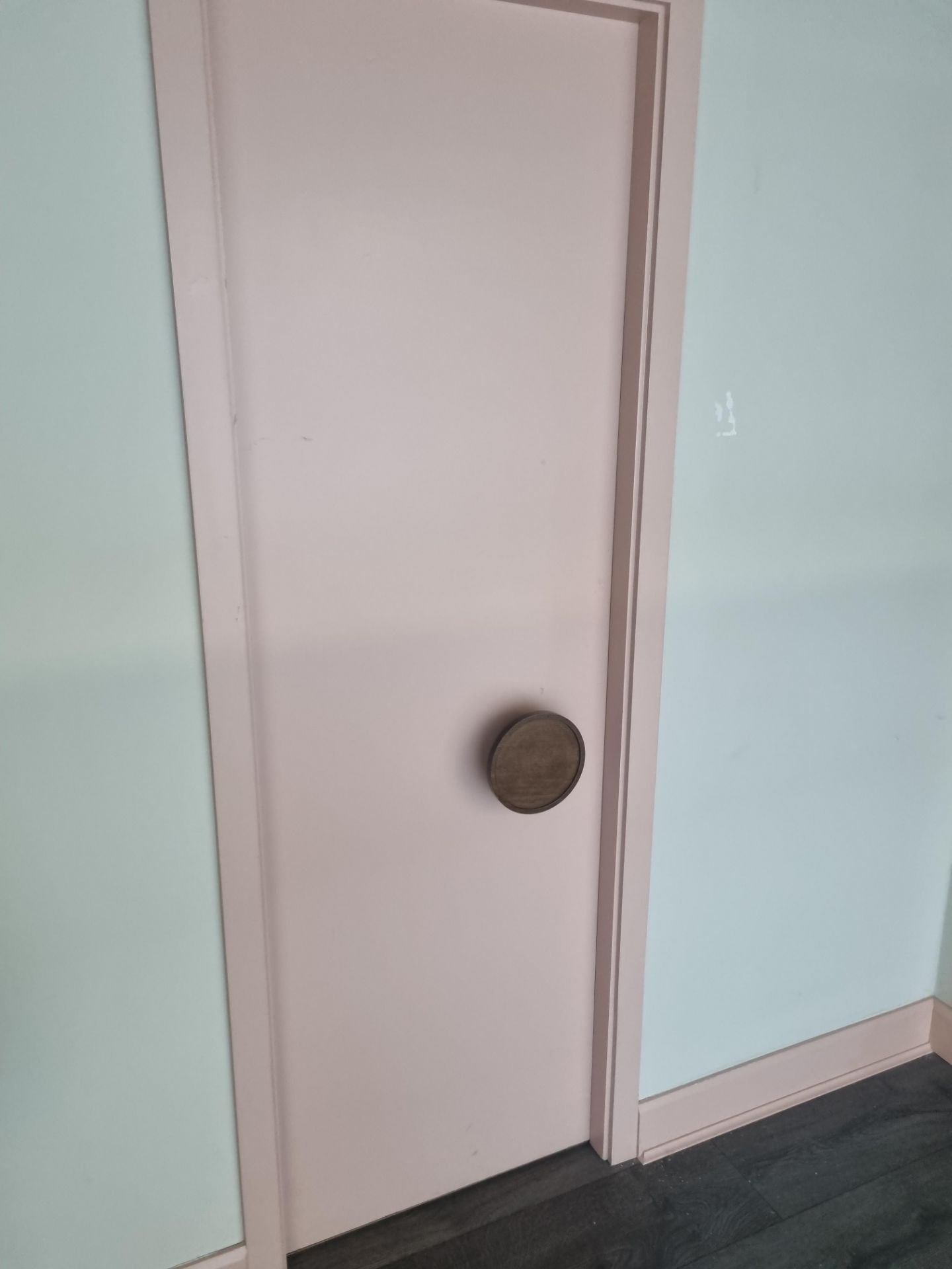 Single door painted pale pink each 82.5 x 45 x 204cm ( Buyers contractor to remove at own cost)