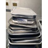 A large quantity of stainless steel trays