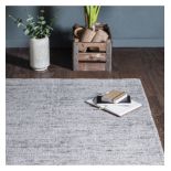 Castillo Rug Grey This luxurious handwoven, tonal rug features a short loop pile with a plain edge