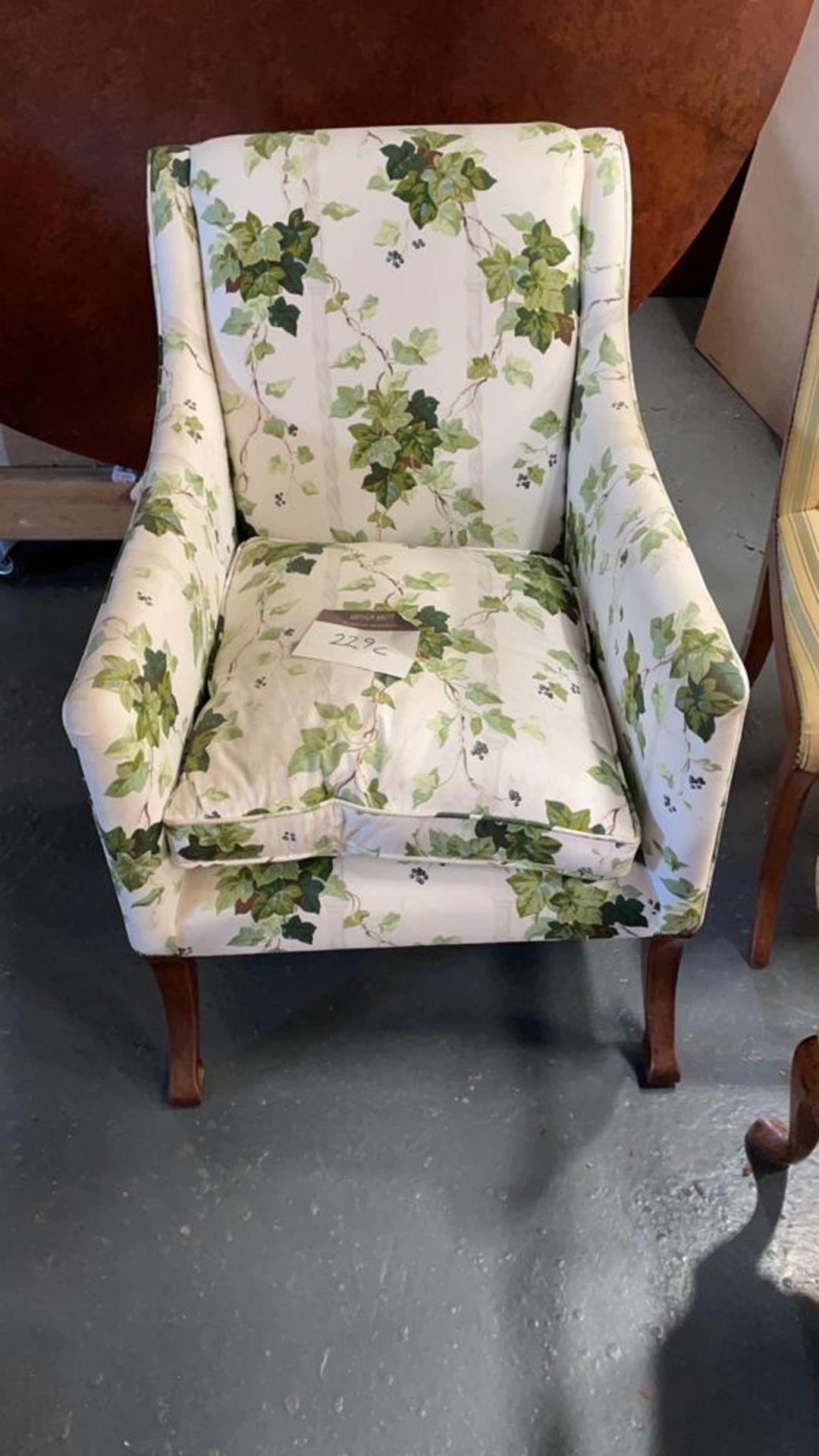 Arthur Brett upholstered arm chair with white & green ivy patterned Height 90cm Width 67cm Depth