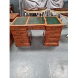 Arthur Brett Walnut Pedestal Desk with three sections of bright green leather inlay on two pedestals