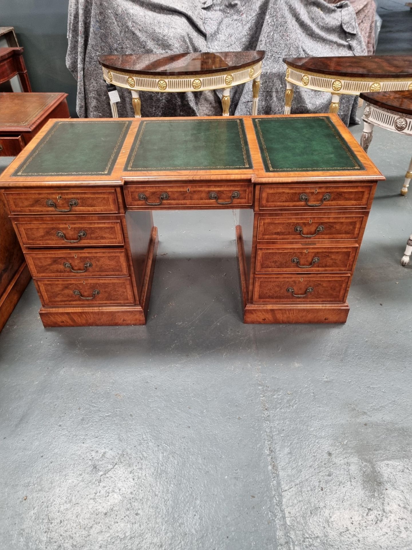 Arthur Brett Walnut Pedestal Desk with three sections of bright green leather inlay on two pedestals