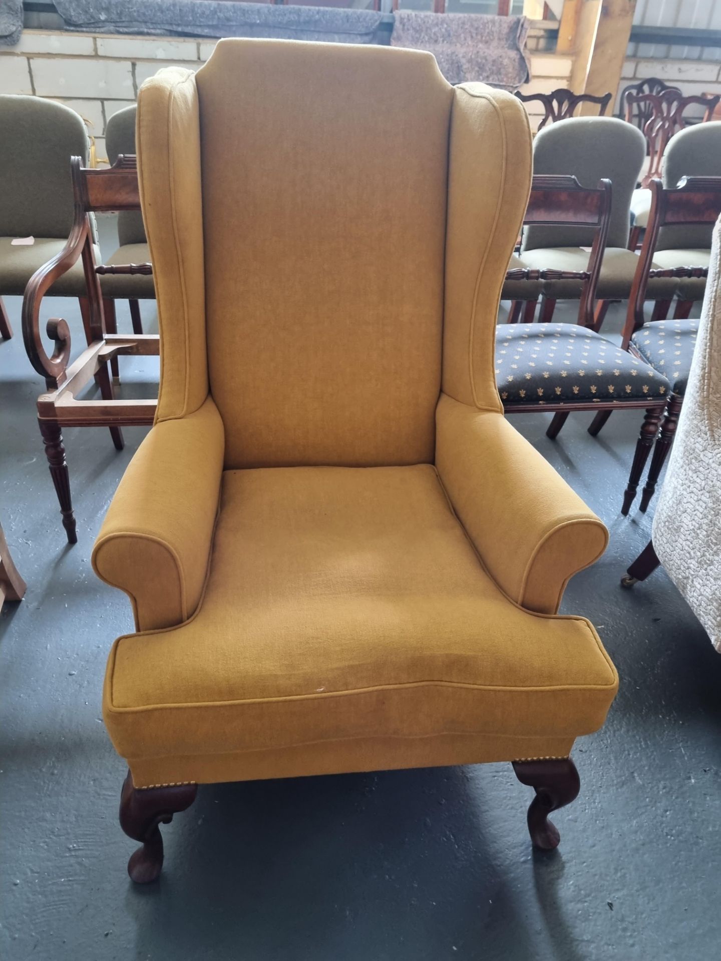 Arthur Brett Mahogany Wing Chair Bespoke Yellow Upholstery Hand-Carved Mahogany Wing Chair Of