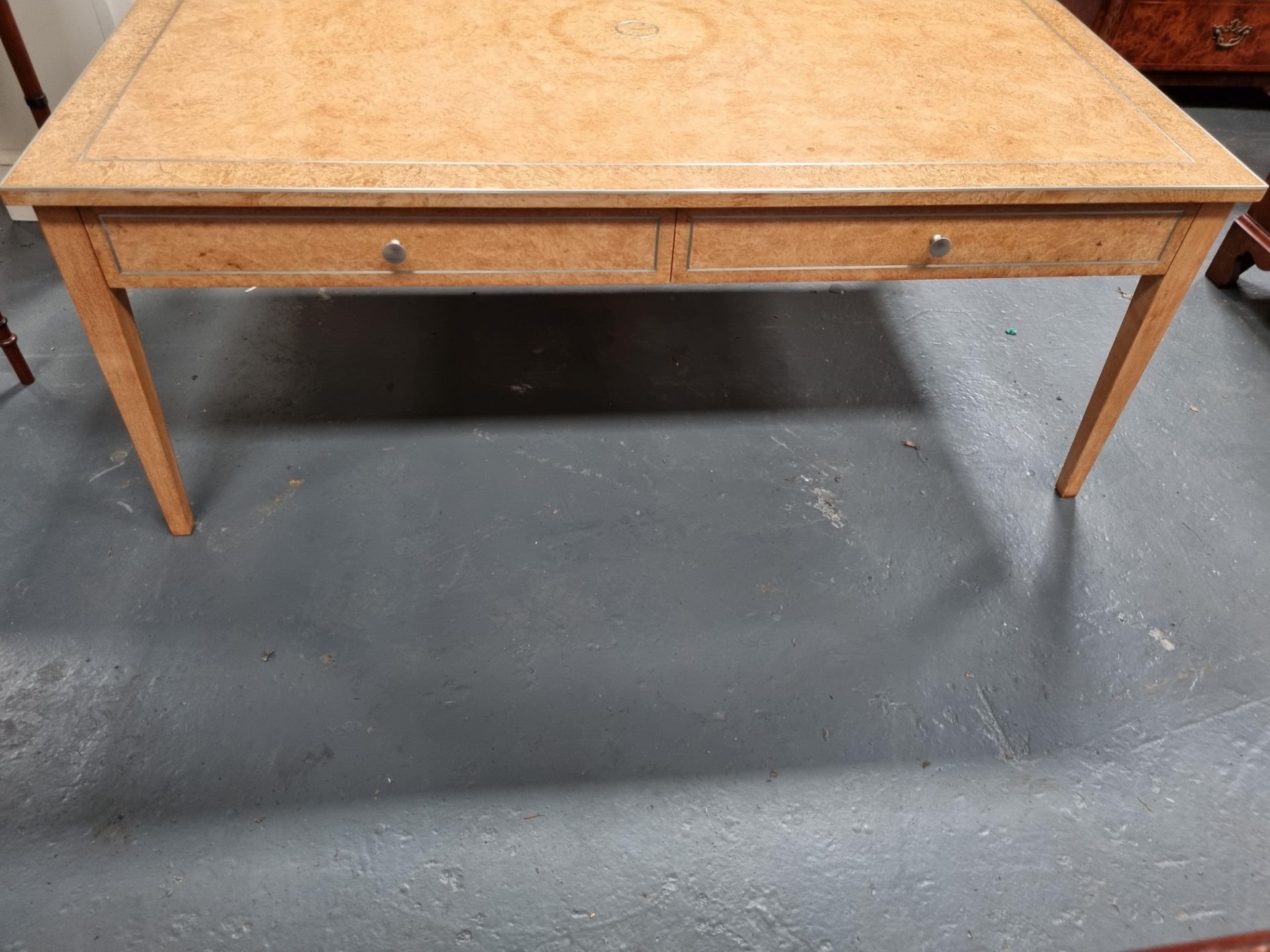 Arthur Brett Burr Maple coffee table with gold inlay and tapered legs Height 50cm Width 127cm