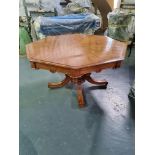 Mahogany Hexagonal dining table on single pedestal with four legs on bras casters Height 800cm