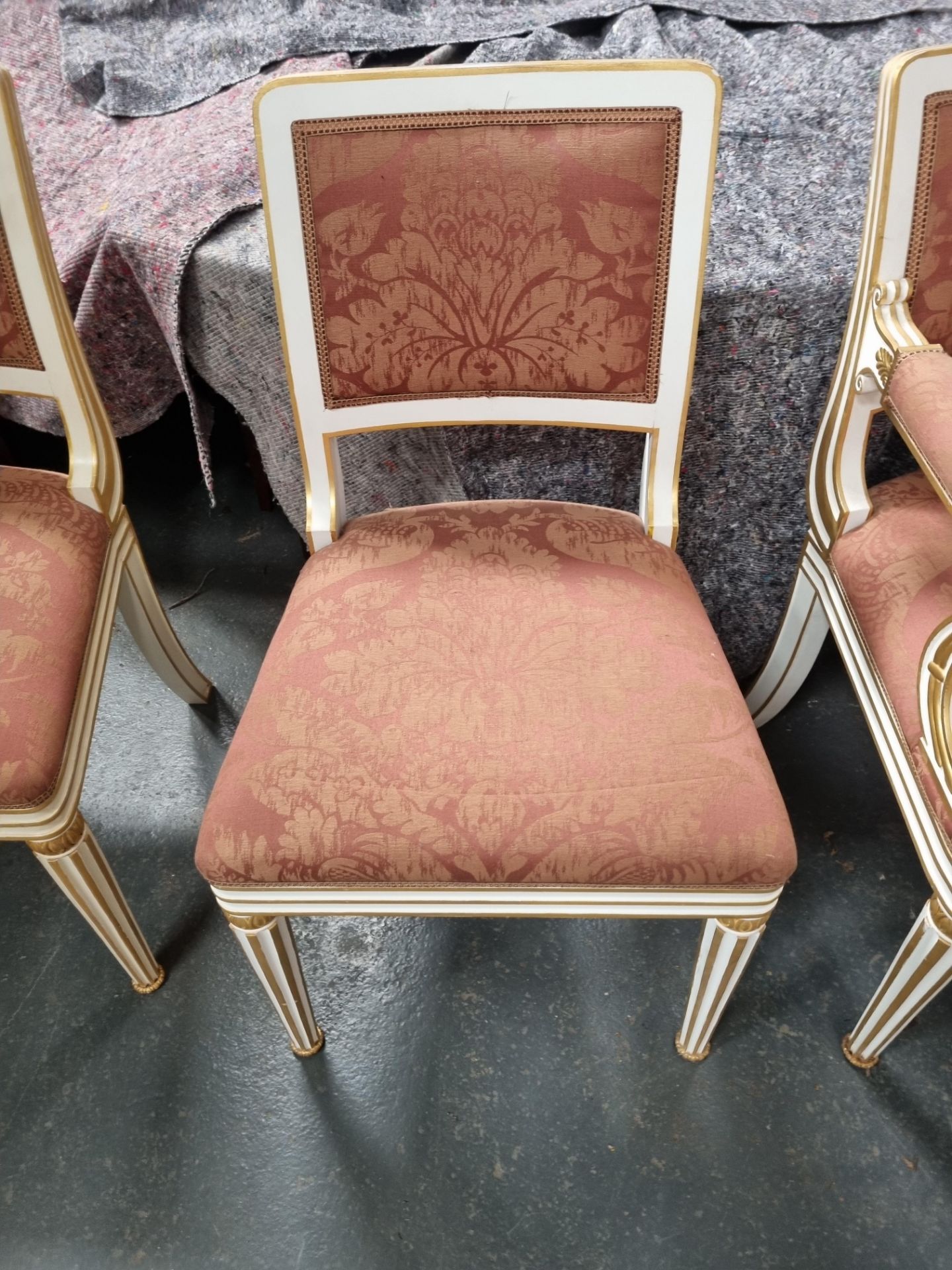 Arthur Brett Dining side chair with Rose gold pattern upholstery seat and back rest on a elegant