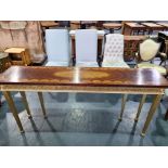 Console table with wooden detailed inlaid top and on gold gilt frame with tapered legs (chip off