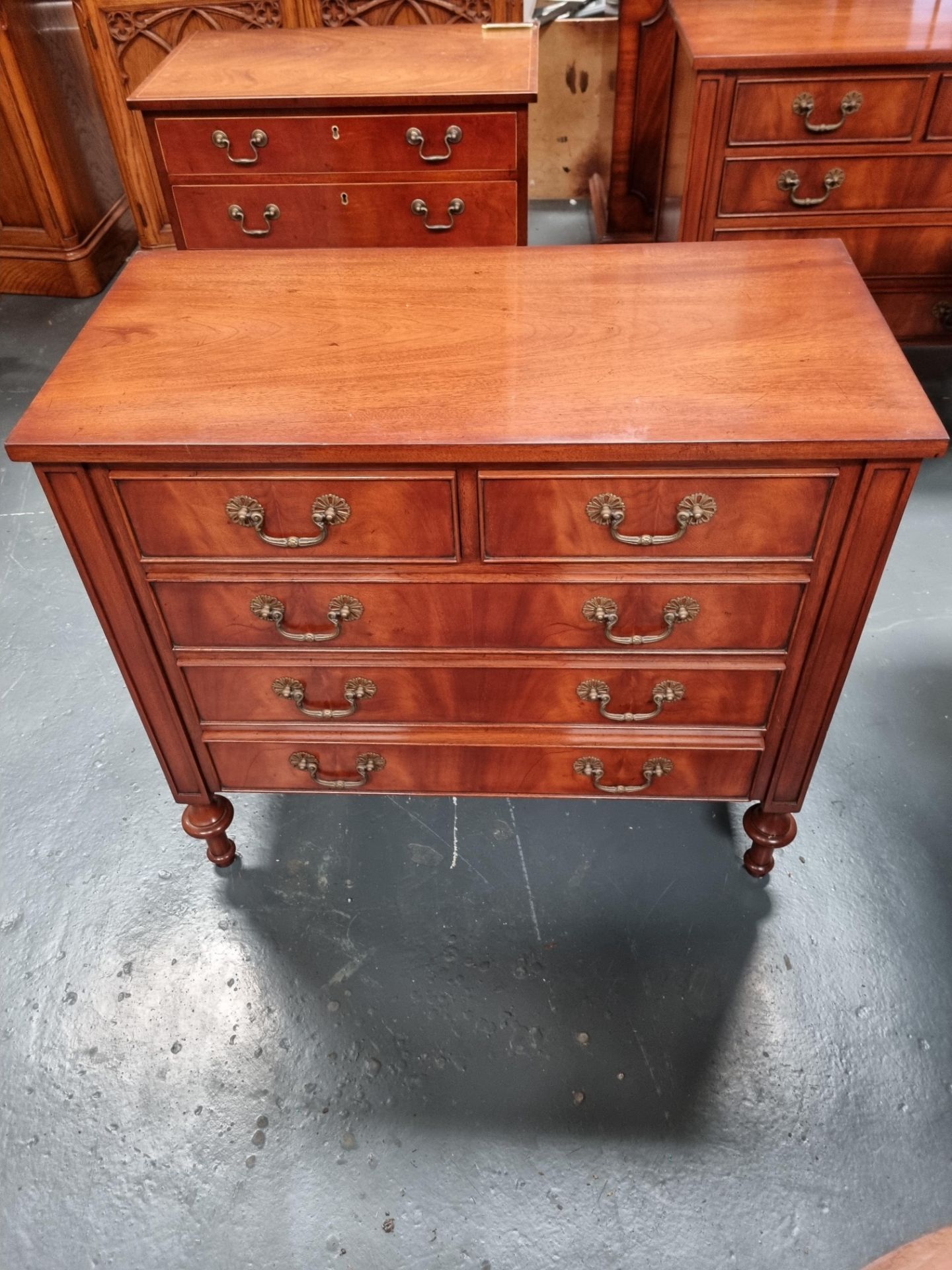 Arthur Brett Mahogany Bedside Chest with 5 drawers finished with brass handles Height 70.5cm width