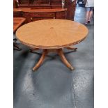 Arthur Brett Extending Mahogany Circular Dining Table With Olivewood Veneers on one pedestal with