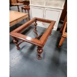 Arthur Brett Walnut Coffee Table (Glass Top is Missing) featuring a cross grain moulded frame. The