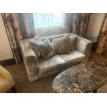 A plush two seater silver silouhette cruhed velvet cube sofa with loose cushions 170 x 92 x 69cm